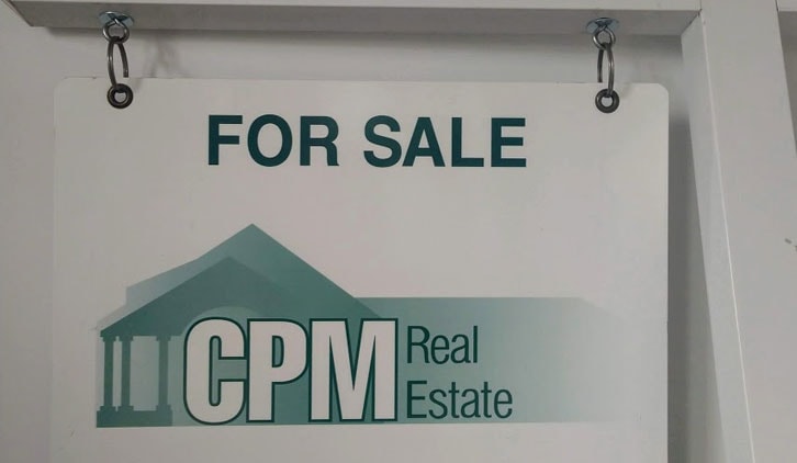 CPM Real Estate for sale sign